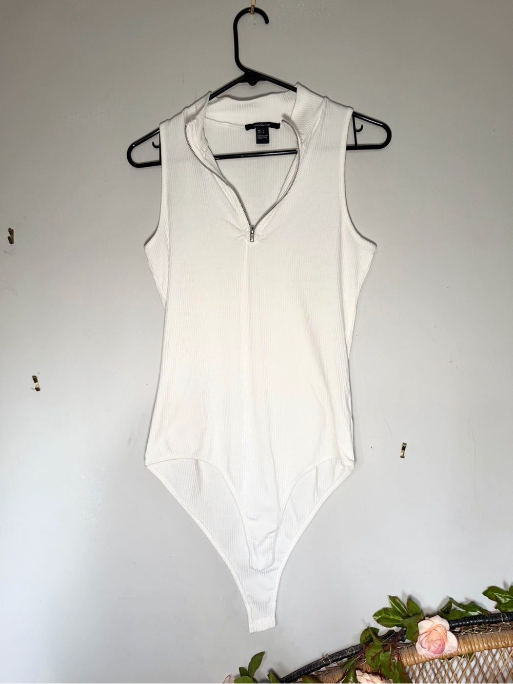 Sleeveless White Ribbed Zip-Neck Bodysuit